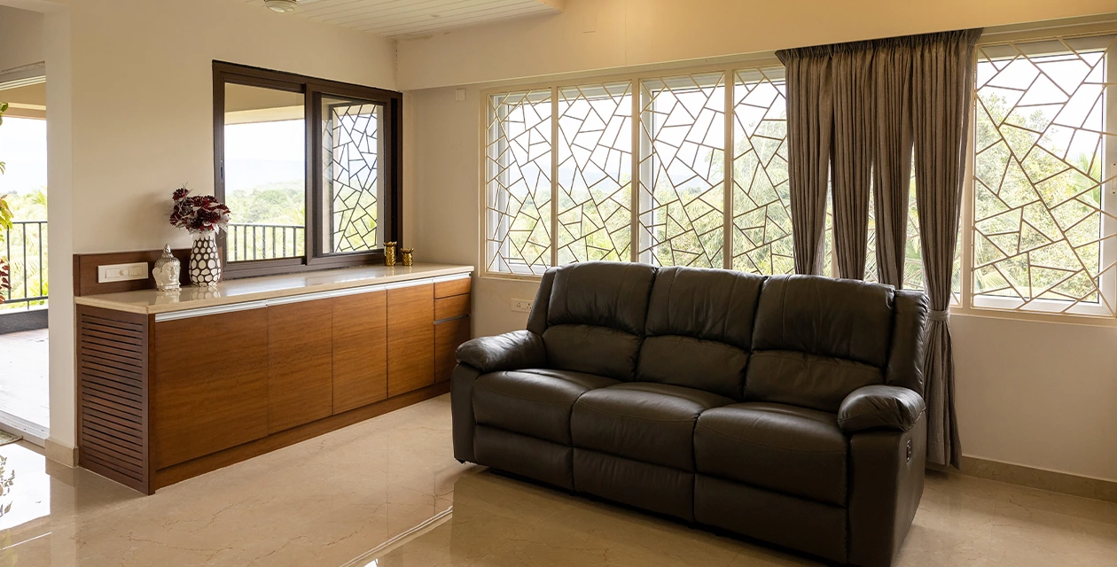 Dark wood tone cabinetry warming the villa interior