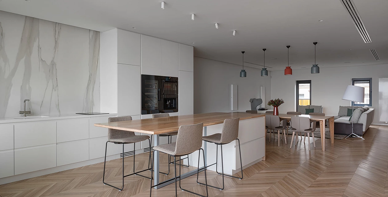 Stainless steel kitchen cabinetry in the Moscow apartment project