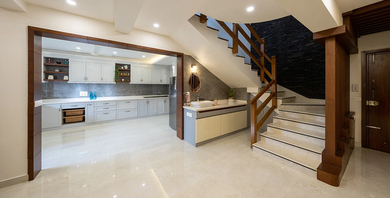 White high-gloss lacquer kitchen cabinets in the Toronto villa