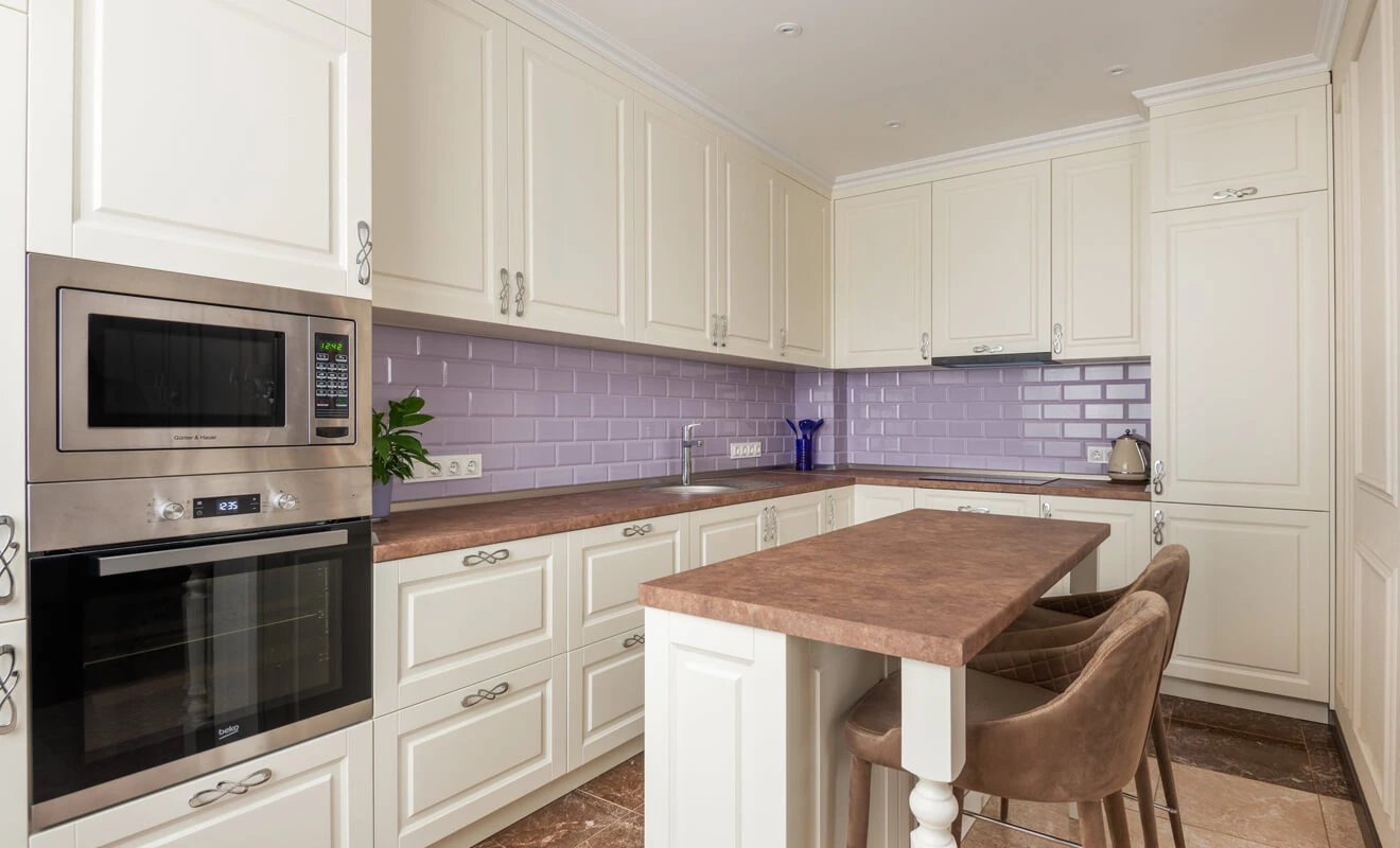 white kitchen cabinets paired with natural textures and light finishes