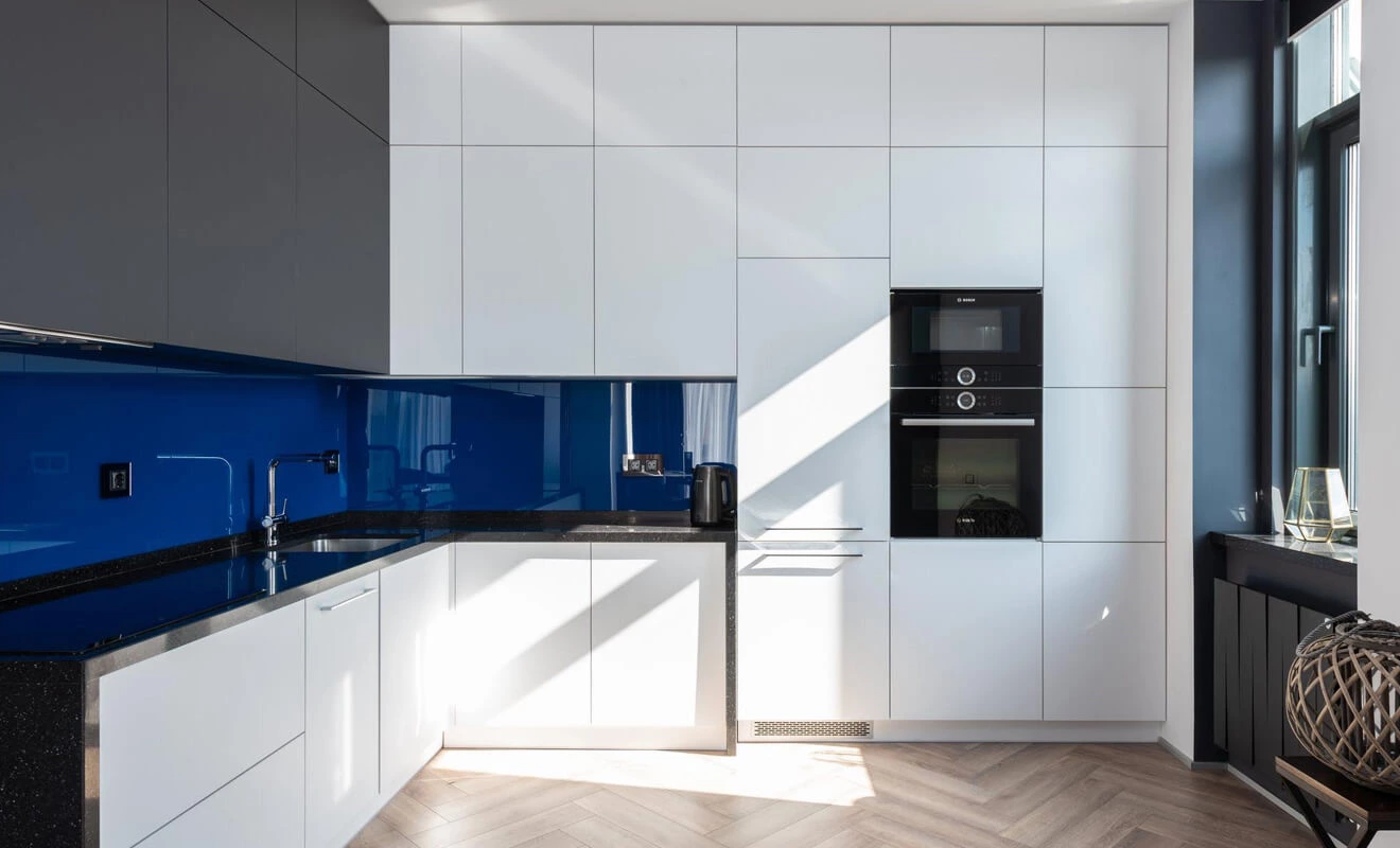 modern white kitchen cabinets with flat panel doors