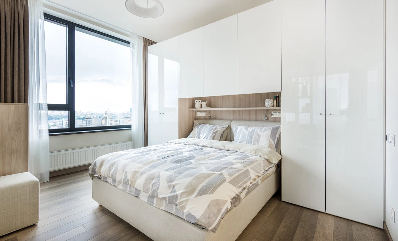 custom wardrobe with mirror lighting and functional storage