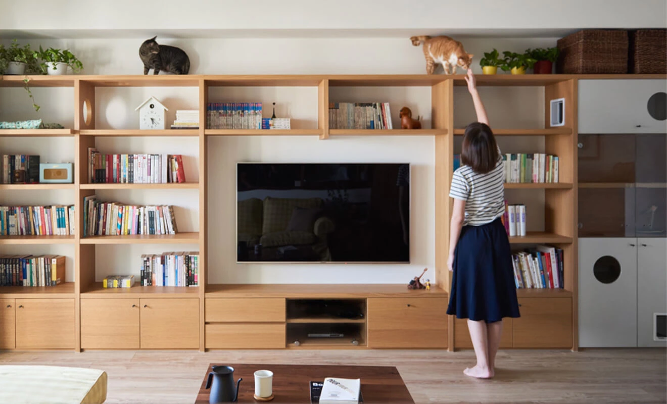 Floor-to-ceiling TV wall cabinets with concealed storage Floor-to-ceiling TV wall cabinets with concealed storage