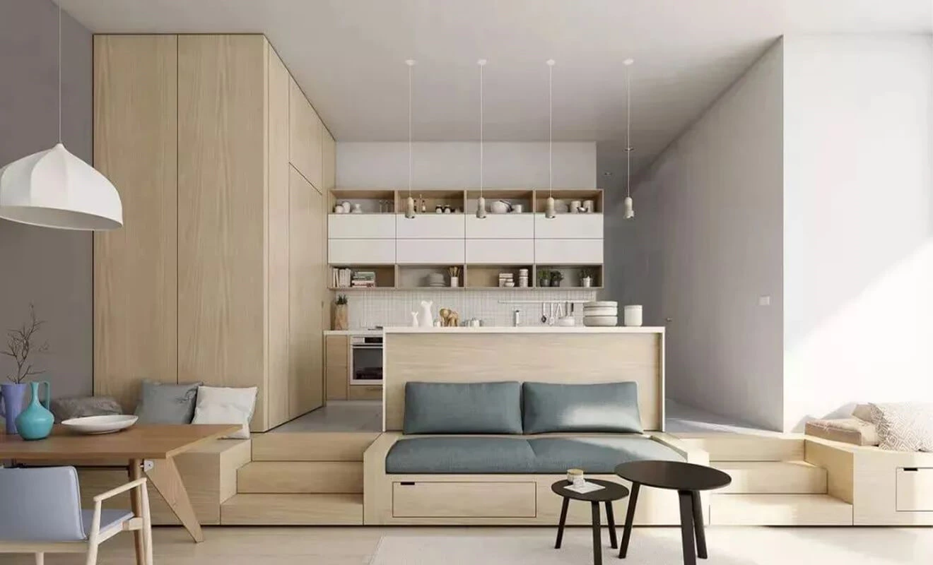 Multifunctional small-home storage cabinets surrounding a compact seating area Multifunctional small-home storage cabinets surrounding a compact seating area