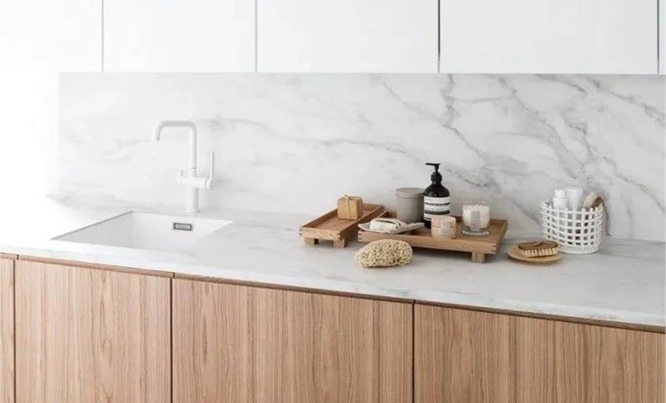 Cabinet edge handle design with a minimal integrated grip Cabinet edge handle design with a minimal integrated grip
