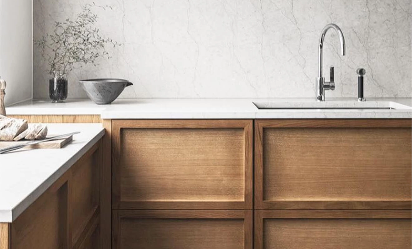 Loop handle integrated into a concealed cabinet door Loop handle integrated into a concealed cabinet door