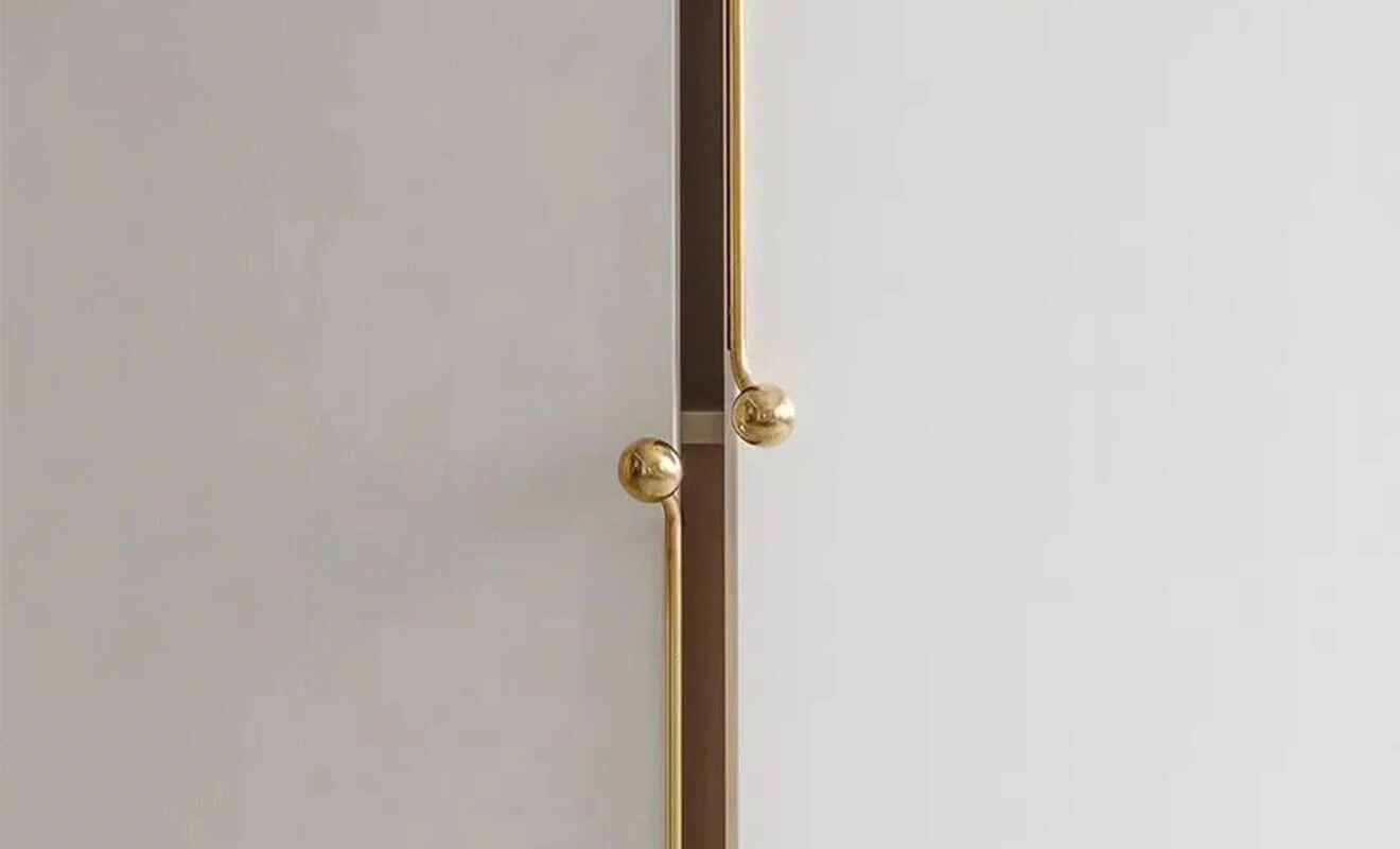 Bedroom wardrobe with gold cabinet handles for a luxury accent Bedroom wardrobe with gold cabinet handles for a luxury accent