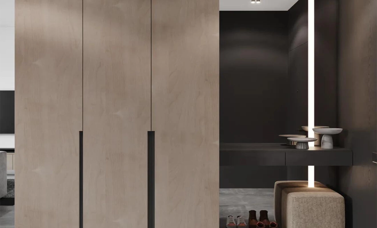 Custom entry cabinet coordinated with a wood finish wall Custom entry cabinet coordinated with a wood finish wall