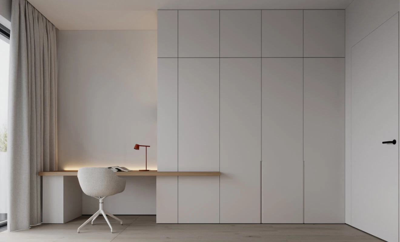 Custom wardrobe with integrated desk for bedroom workspace