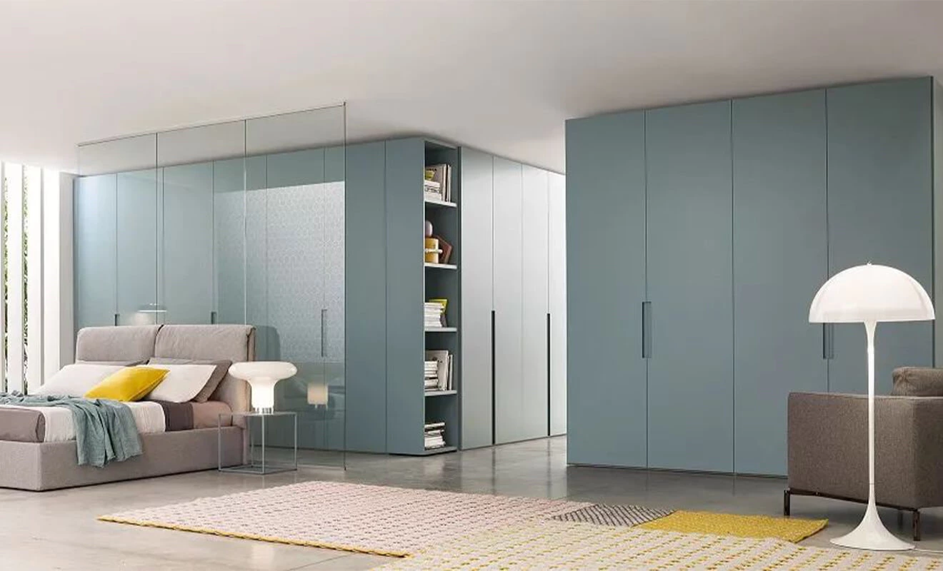 Handleless bedroom wardrobe with floor-to-ceiling storage