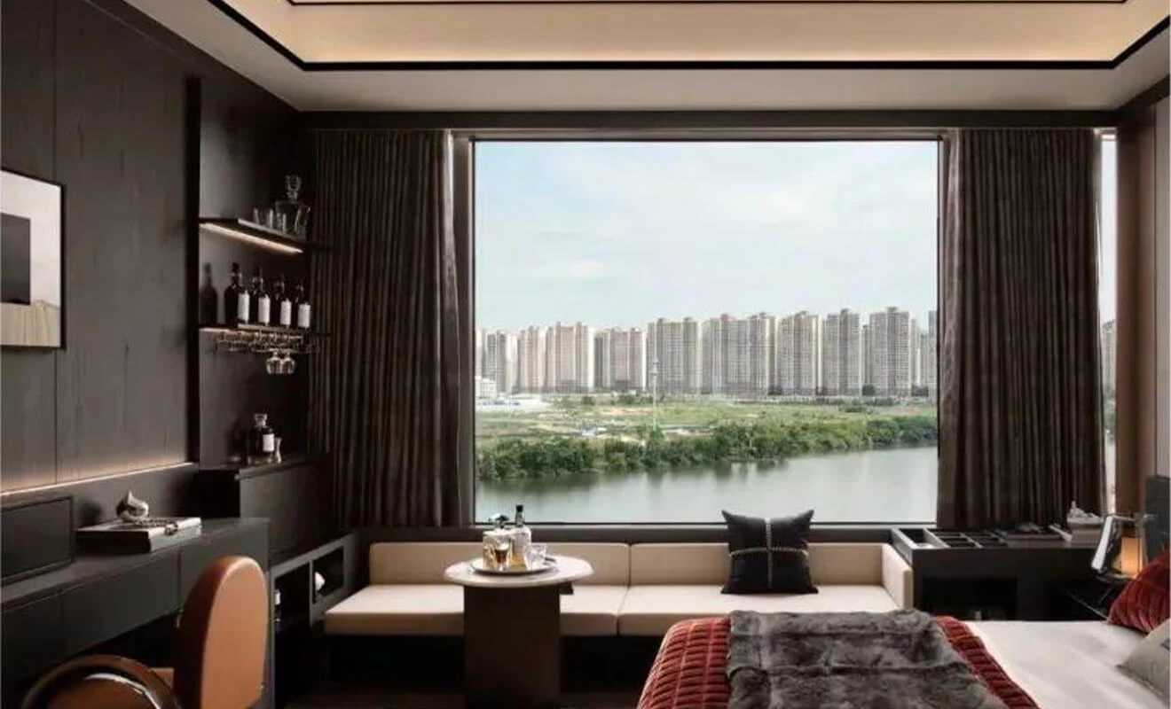 Bedroom window nook with mini bar cabinet and elegant lighting Bedroom window nook with mini bar cabinet and elegant lighting