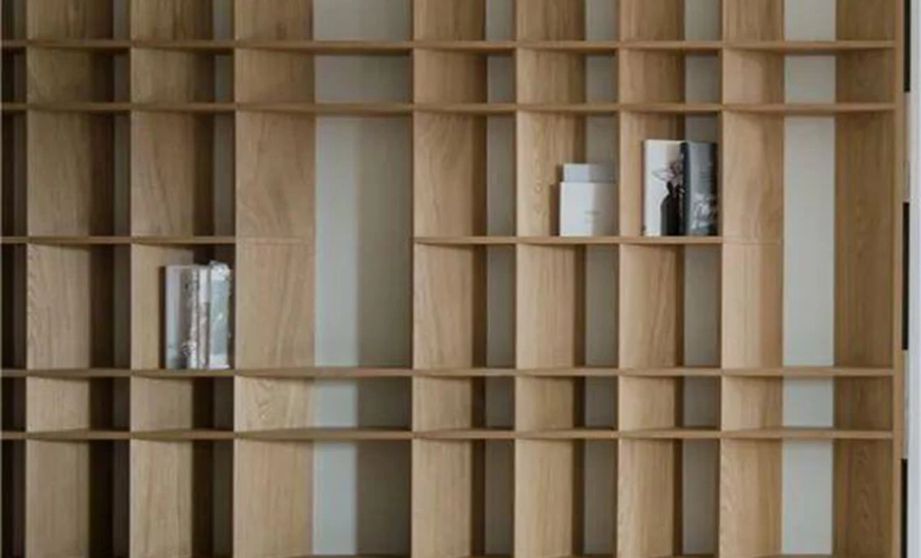 Slanted bookshelf custom cabinet for a narrow home space Slanted bookshelf custom cabinet for a narrow home space