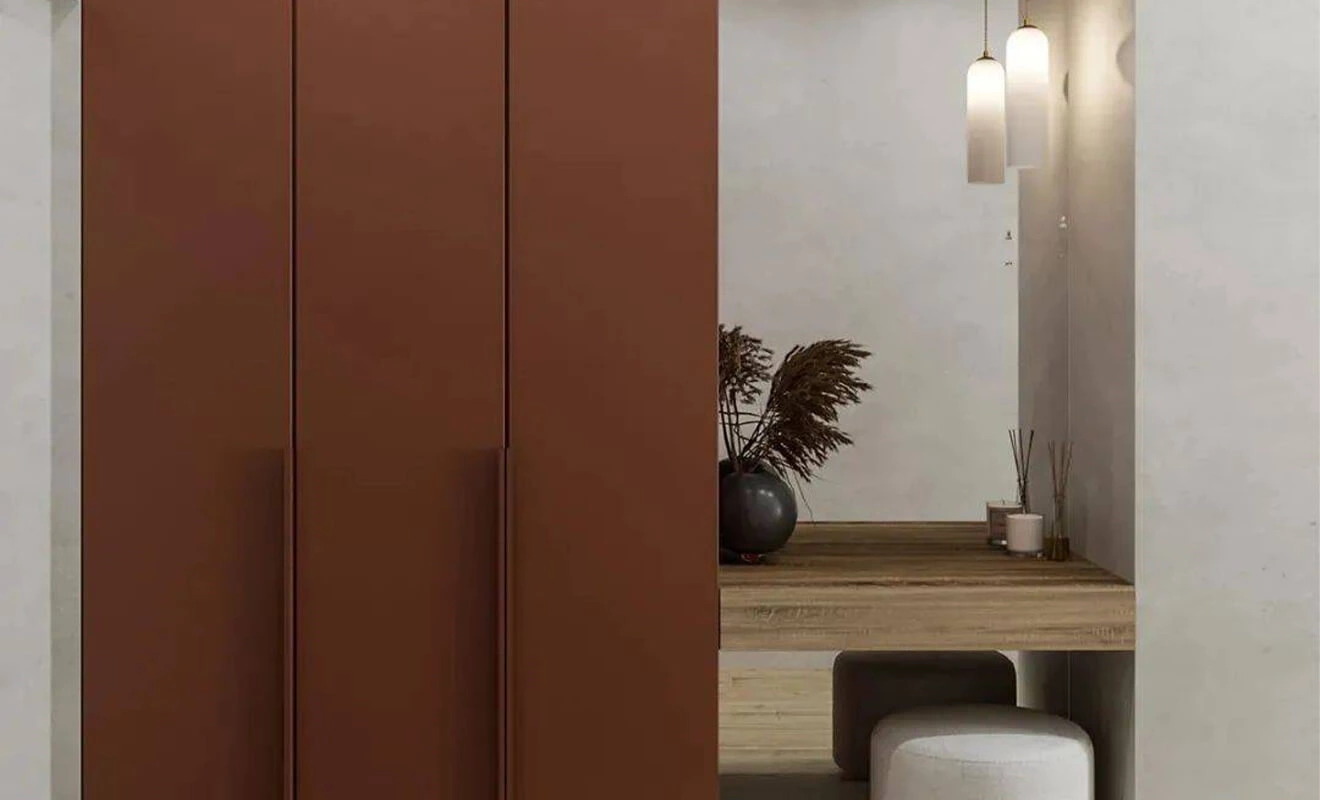 Floor-to-Ceiling Handleless Cabinet Doors Floor-to-ceiling handleless cabinet doors with a minimalist finish