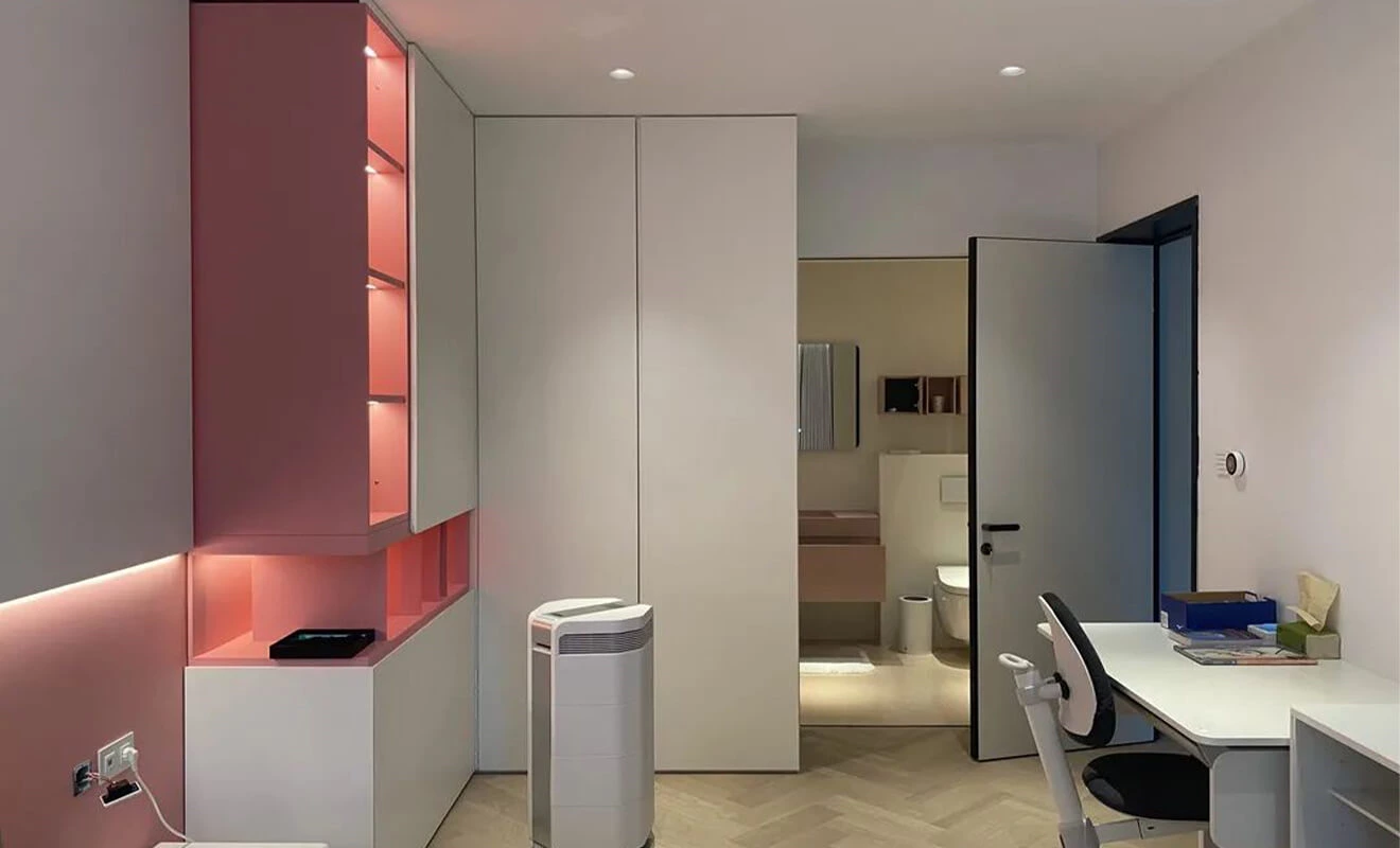 Floor-to-Ceiling Wardrobe Doors Floor-to-ceiling wardrobe doors in a modern bedroom