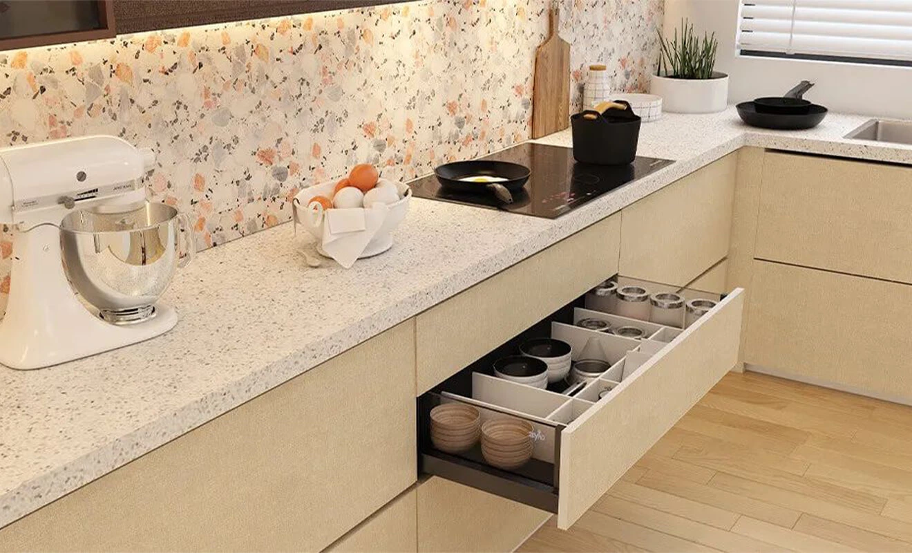 Modern kitchen with durable quartz countertop and integrated cooktop