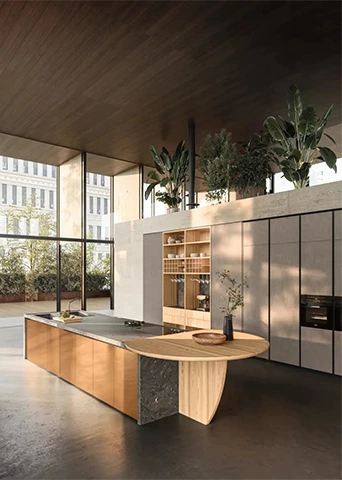 Warm Wood Kitchen Island Cabinetry with Sintered Stone Cooktop