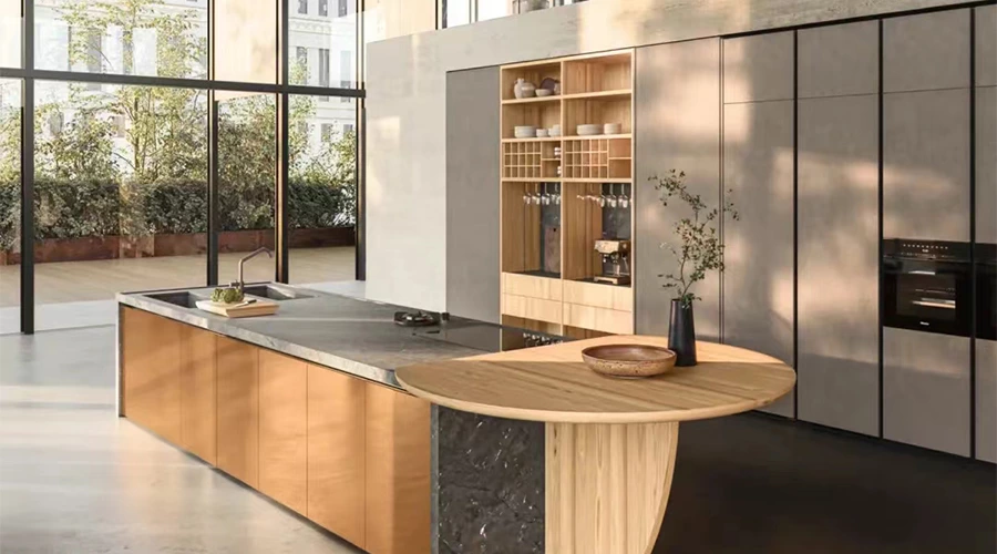Warm Wood Kitchen Island Cabinetry with Sintered Stone Cooktop