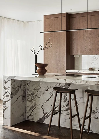Natural Wood Kitchen cabinets with Marble Island and Fluid L-Shaped Layout