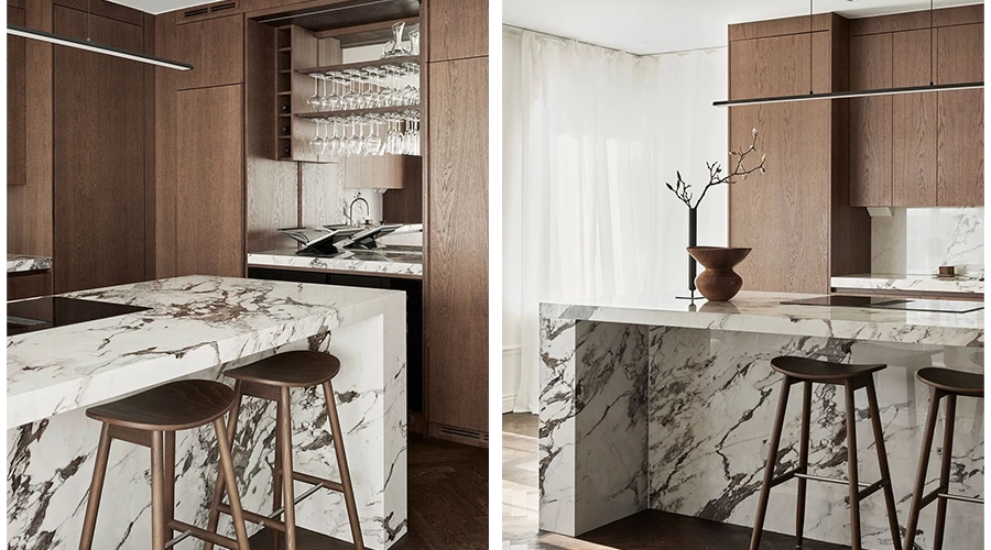 Natural Wood Kitchen cabinets with Marble Island and Fluid L-Shaped Layout