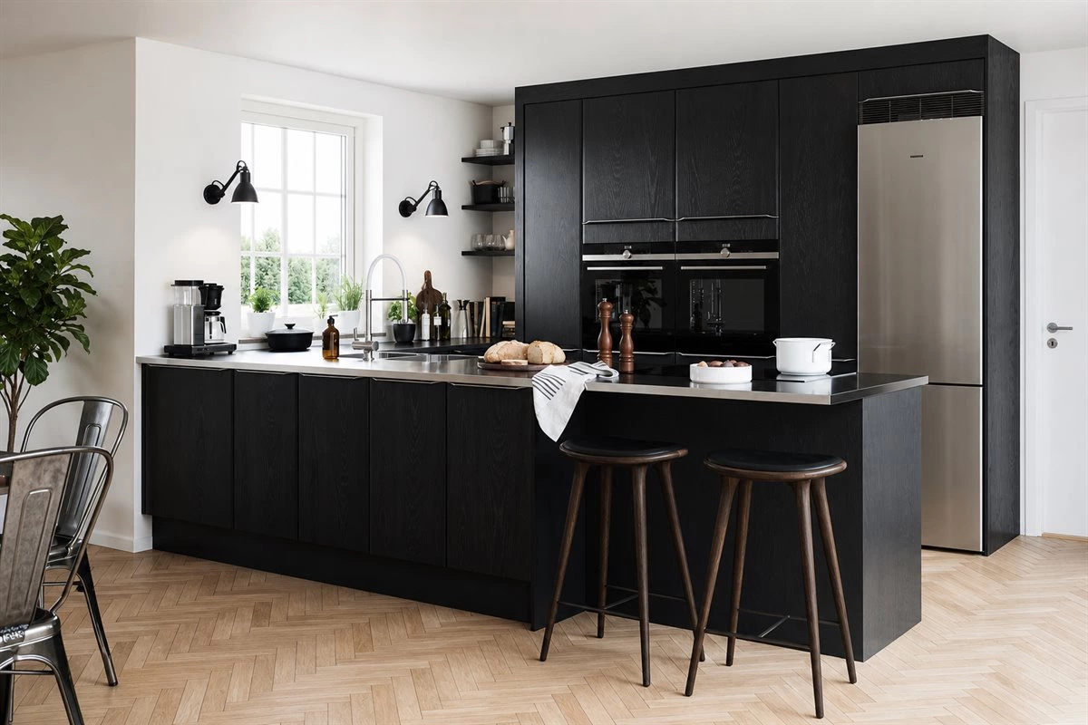 Black wood veneer kitchen with stainless steel details Black wood veneer kitchen with stainless steel countertop and integrated pulls
