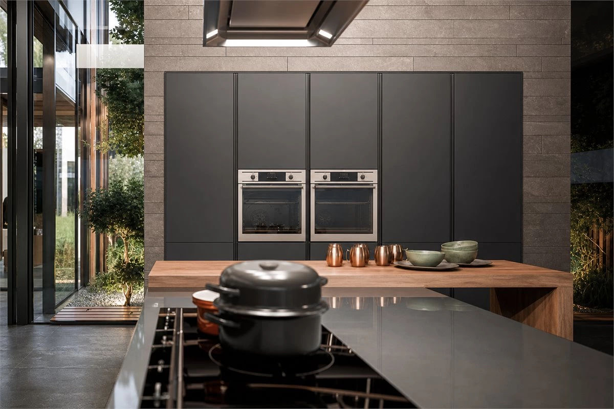 Built-in kitchen appliances integrated into tall custom cabinets