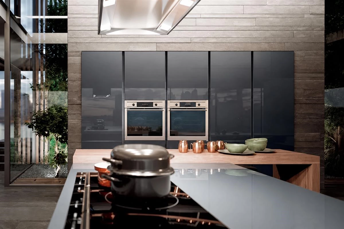Built-in kitchen appliances integrated into tall custom cabinets