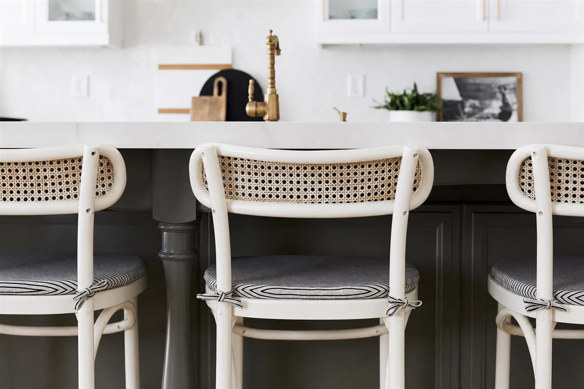 Charcoal grey kitchen island with dark cabinets