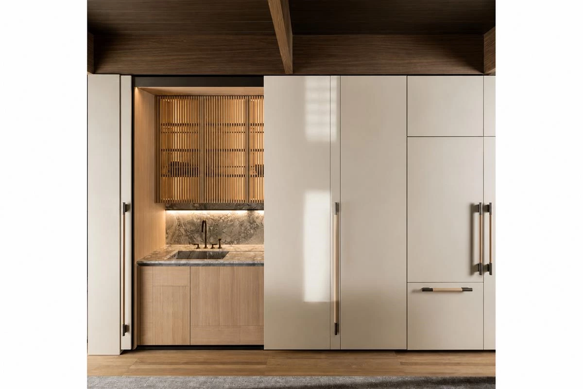 Concealed kitchen storage cabinet with organized internal drawers