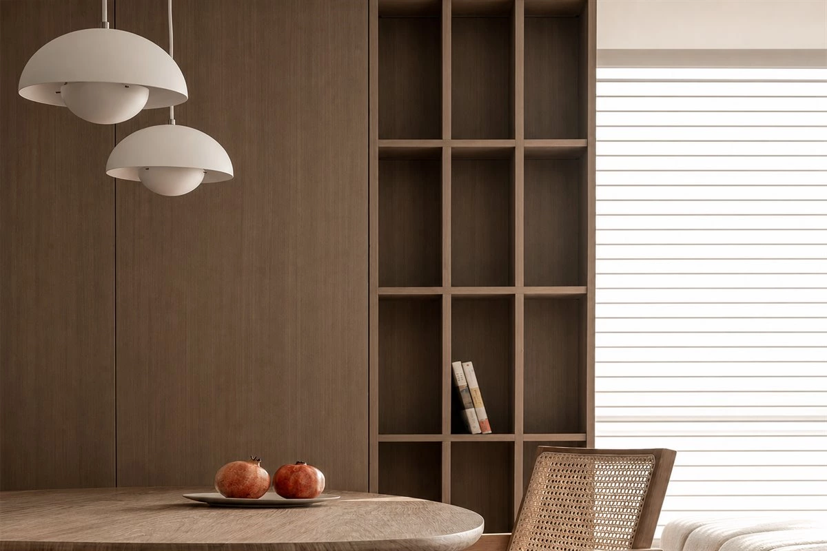 Custom dining sideboard providing extra kitchen storage in a compact apartment