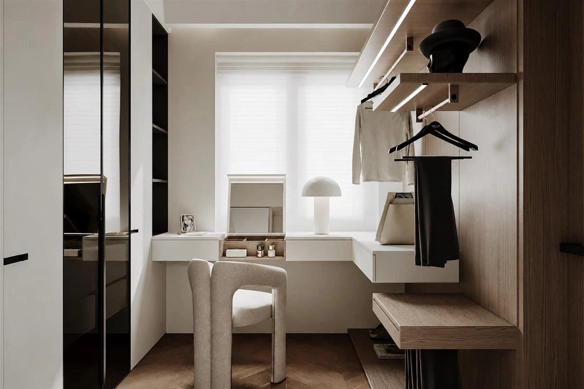 Light neutral walk in closet with spacious custom storage