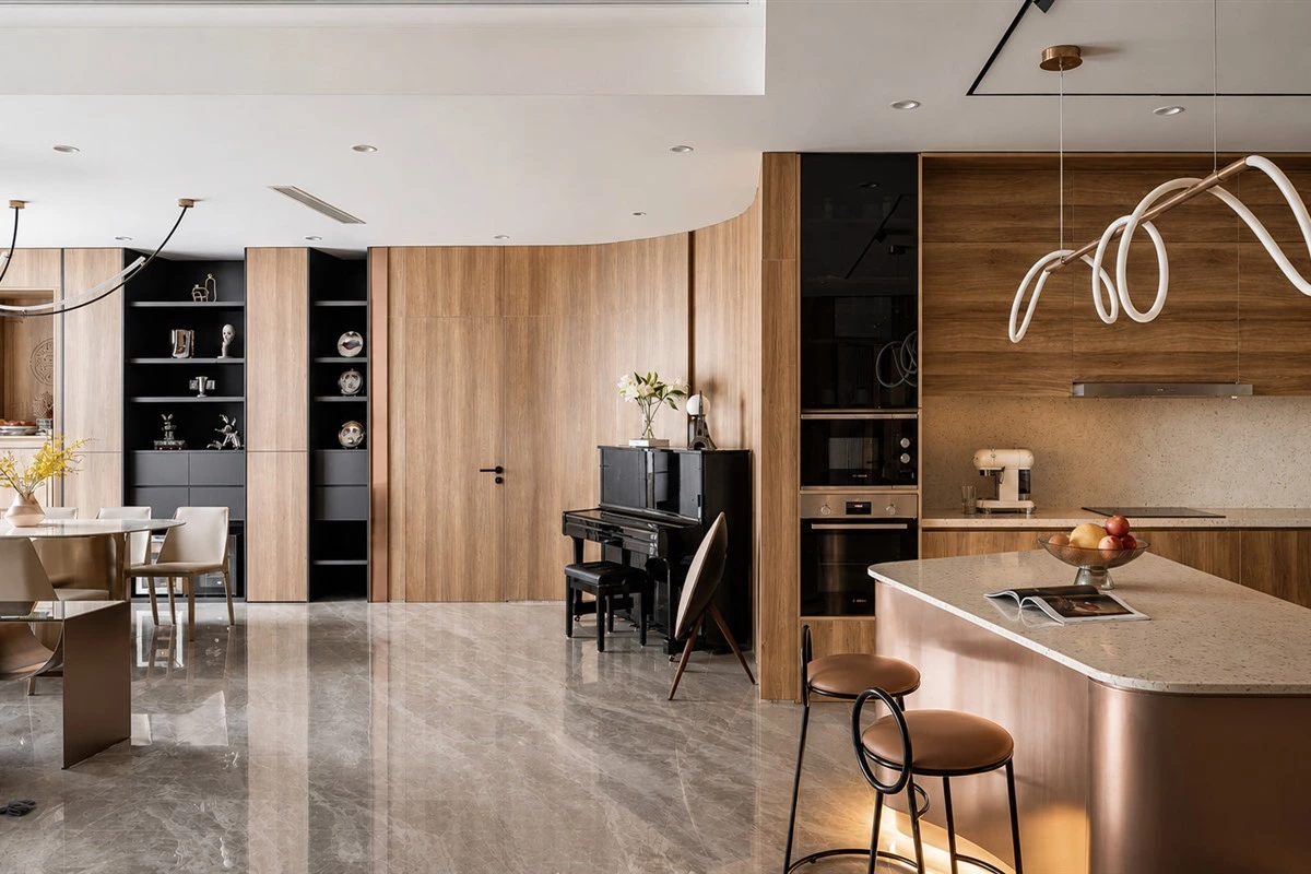 Open-plan kitchen layout connected to living and dining space