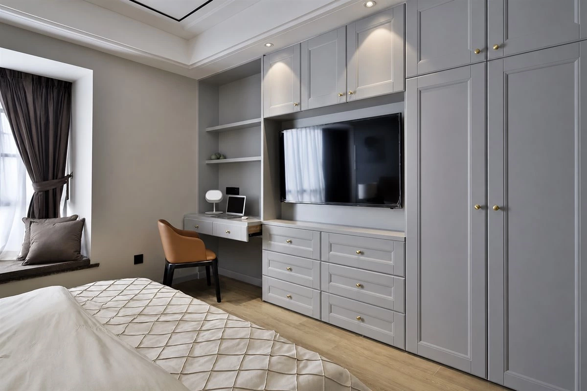 Small U-shaped walk-in closet design with custom wardrobe storage