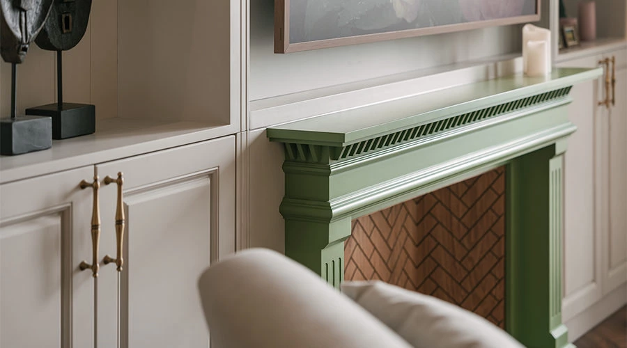 Arched TV wall with Shaker-style cabinet doors and concealed storage