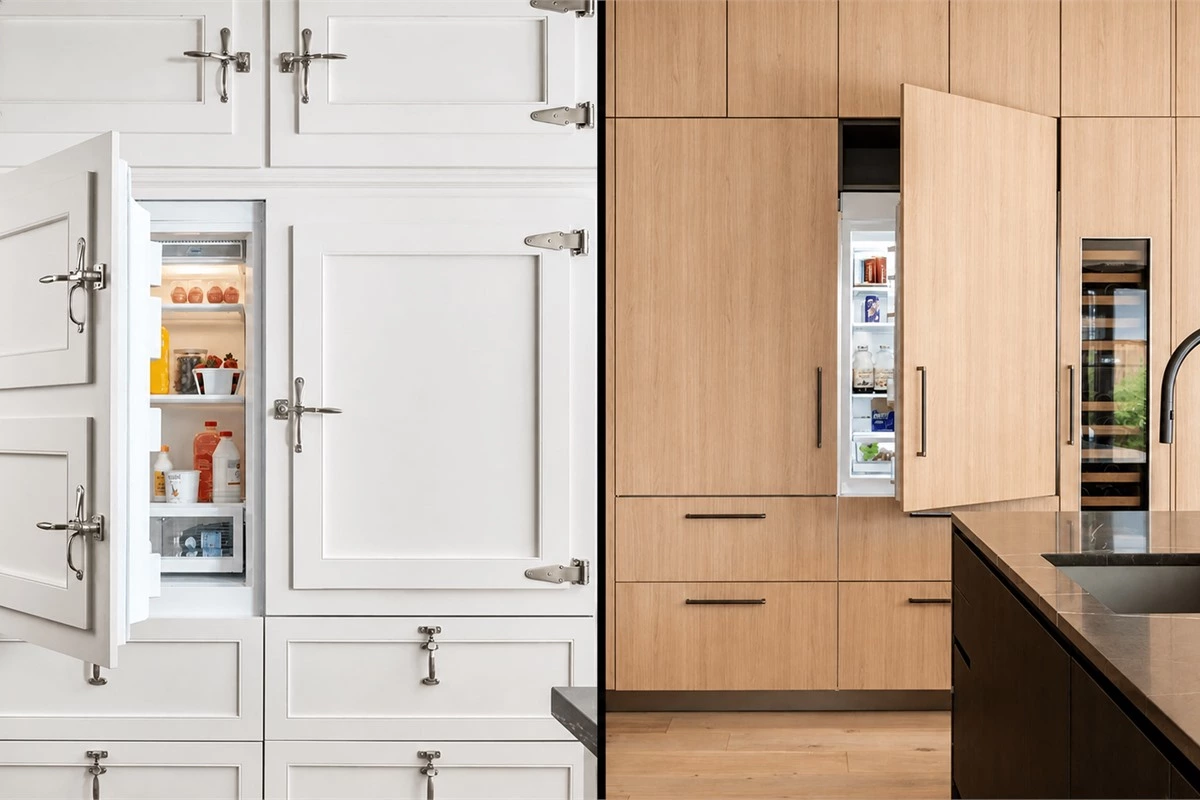 Built-in refrigerator concealed behind matching kitchen cabinet panels