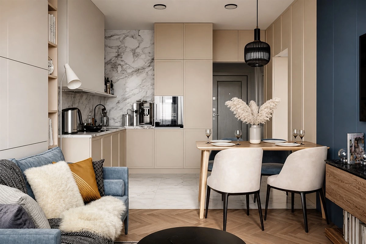 Creamy beige kitchen with warm neutral cabinets and marble countertop