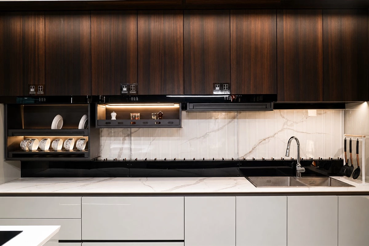 Electric lifting shelf in an upper kitchen cabinet