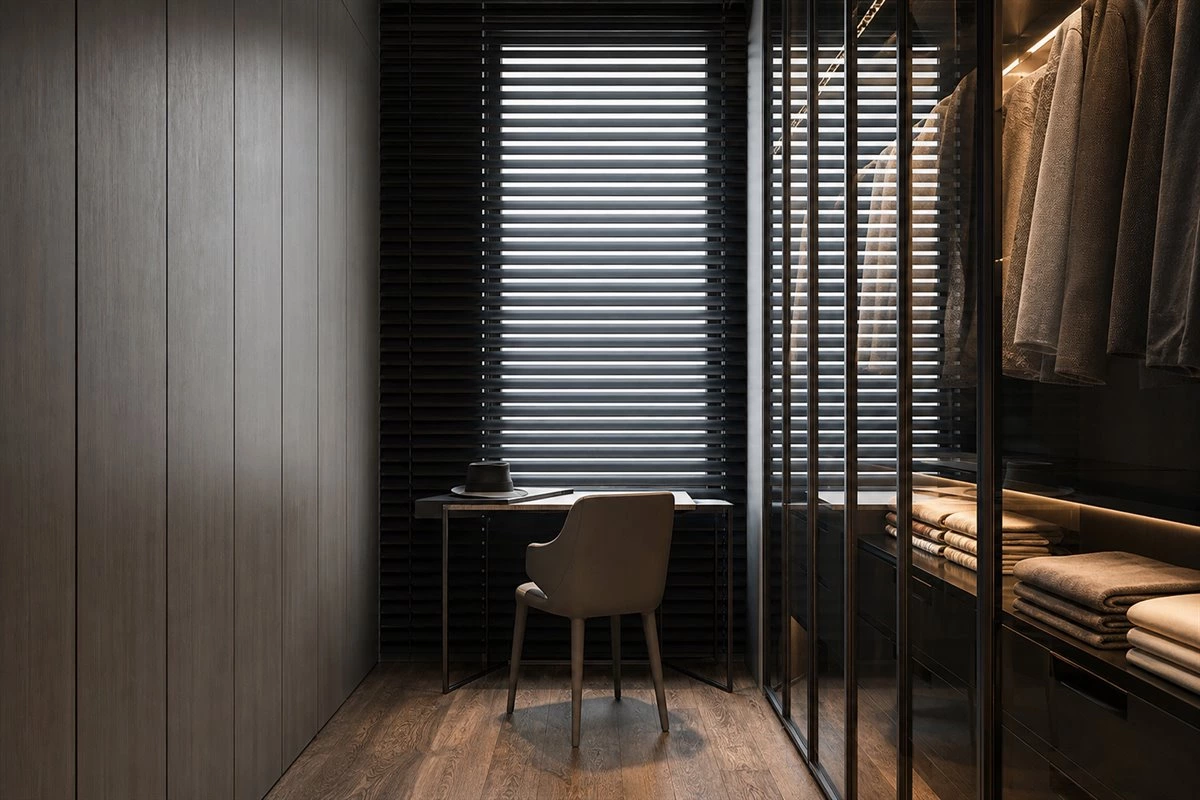 Compact walk-in closet with metal framed glass wardrobes and solid storage