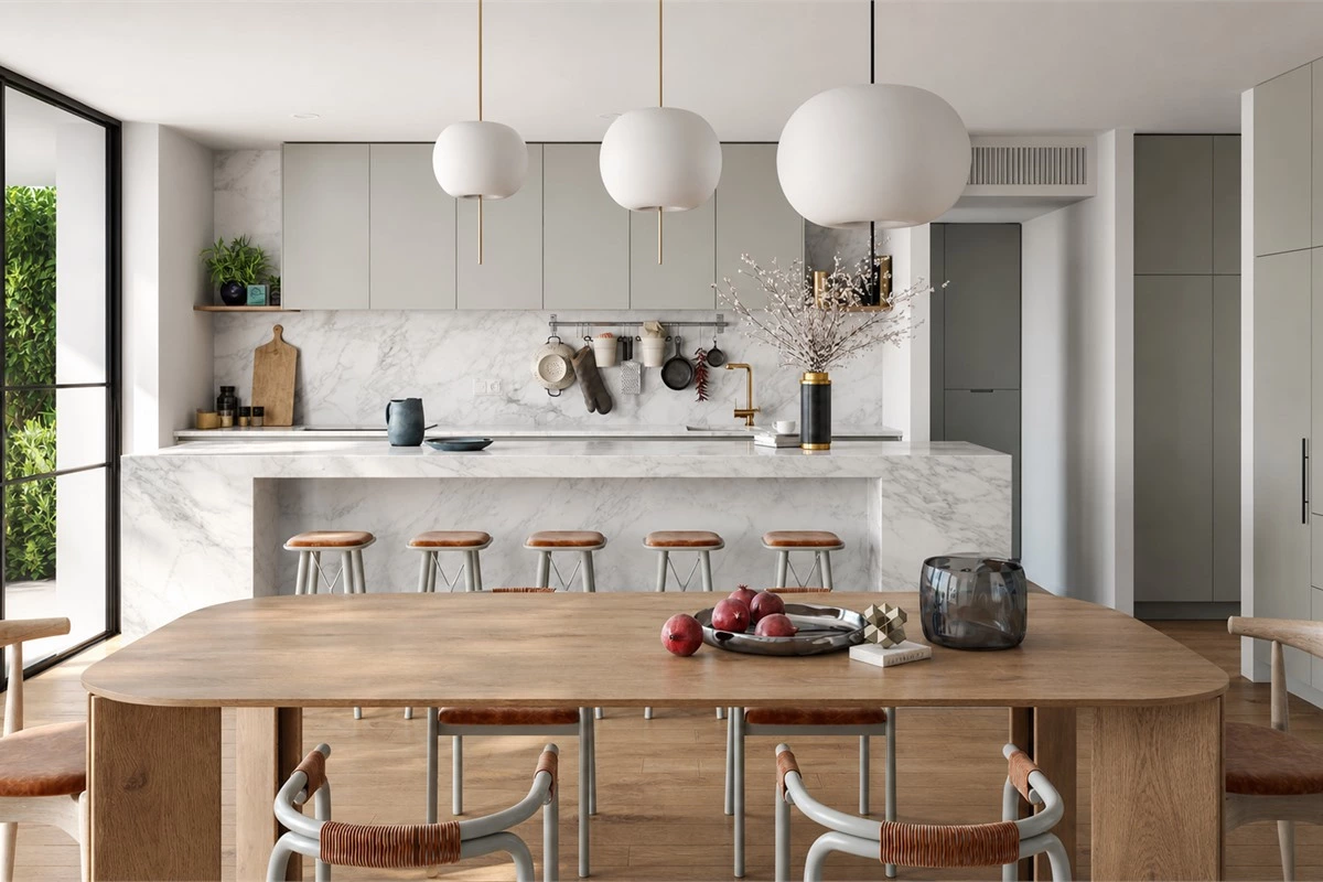 Greyish green minimalist kitchen cabinets with white marble countertop and hardwood accents