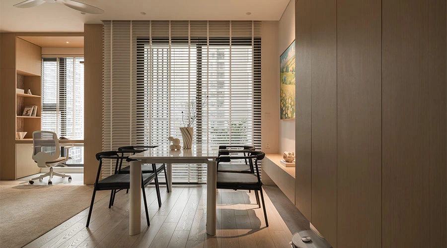 Open study with built-in desk in a minimalist apartment design