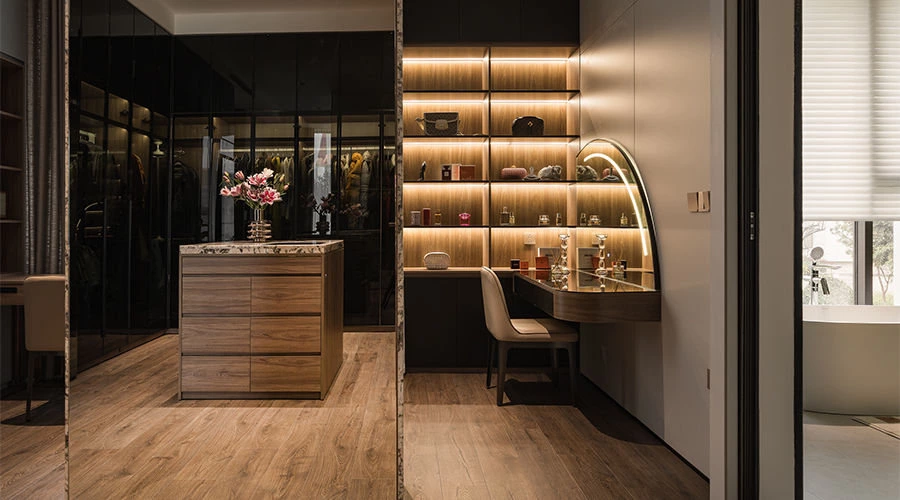 Integrated wardrobe lighting in a connected walk-in closet