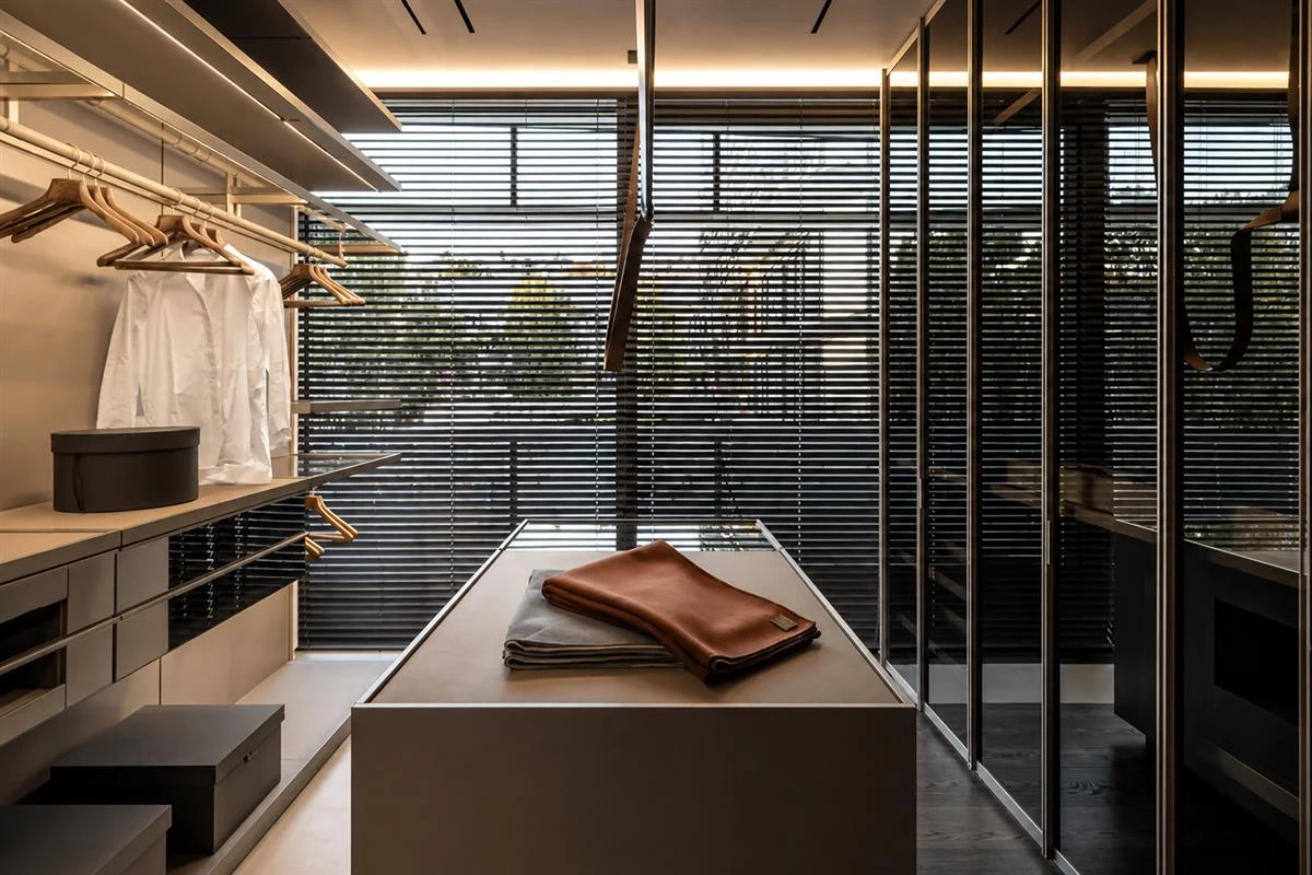 Glass front walk in closet cabinets with protected display storage
