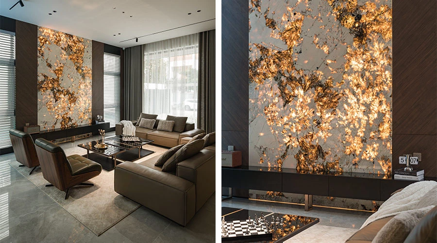 Golden illuminated stone and layered lighting in a modern living room