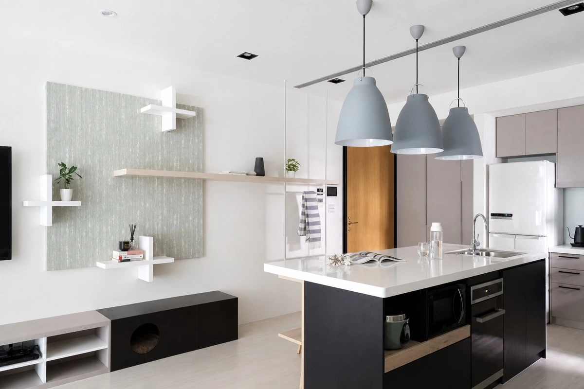 Kitchen island with integrated appliances and organized storage