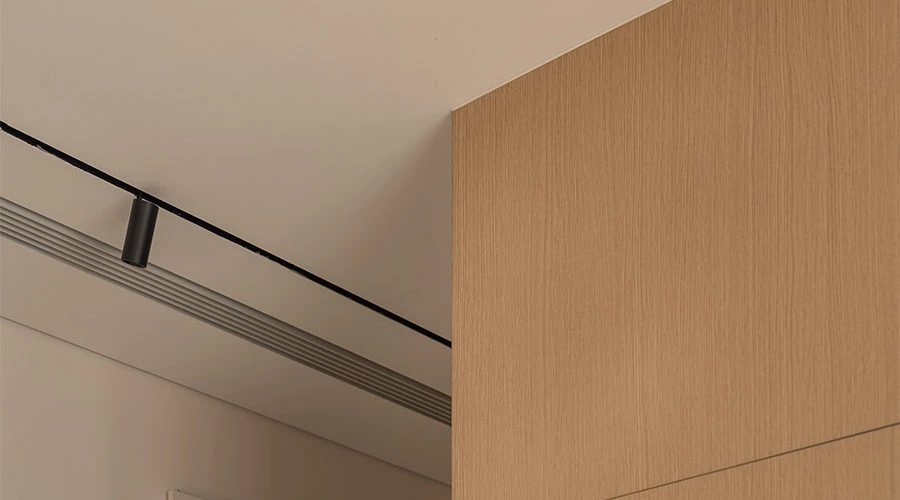 Floor-to-ceiling storage detail in a minimalist apartment design