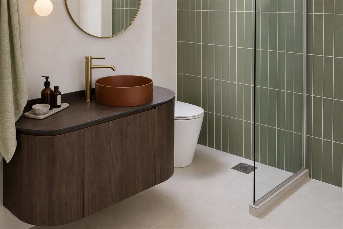 Curved custom bathroom vanity for a compact bathroom layout