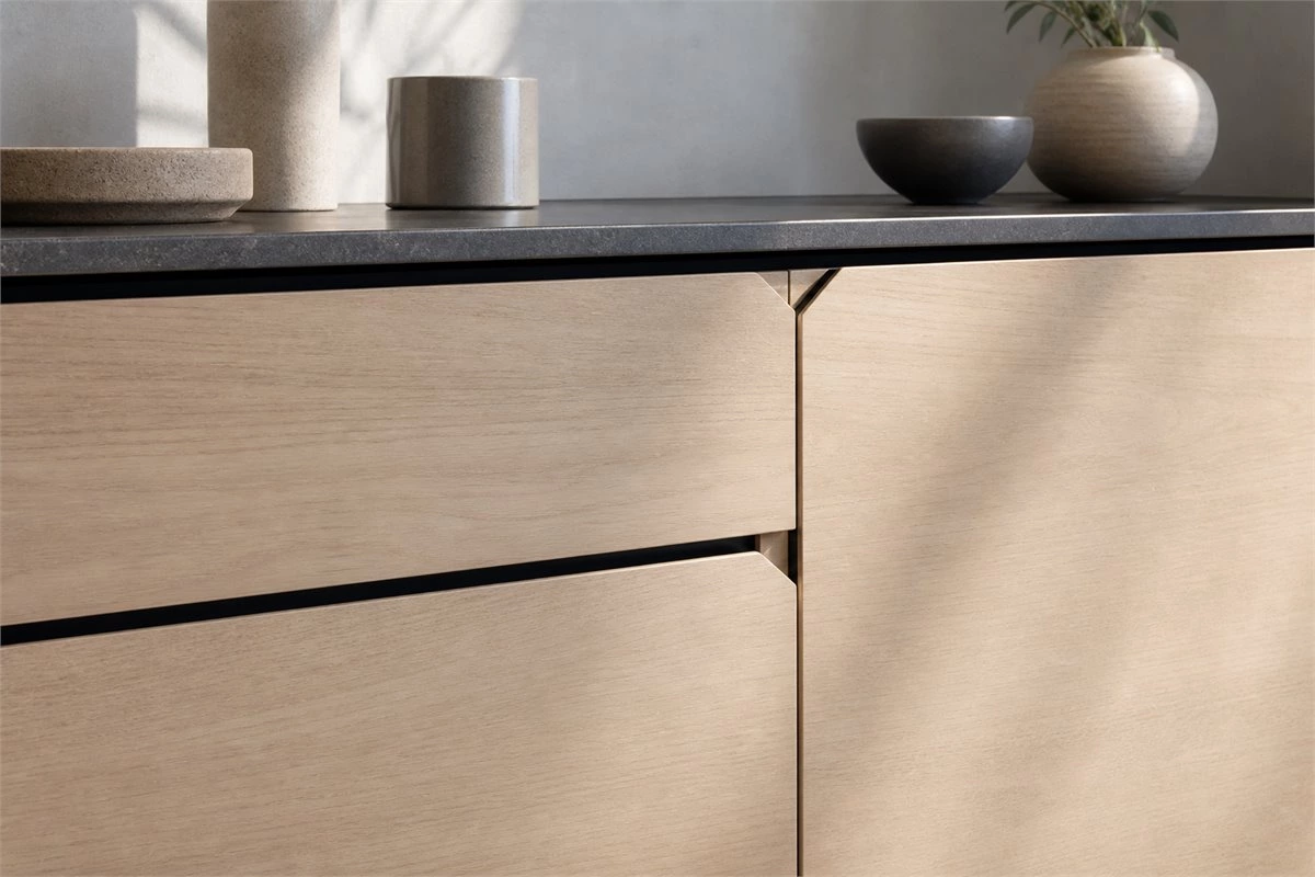 Inset pull notch and Gola profile on modern handleless kitchen cabinets