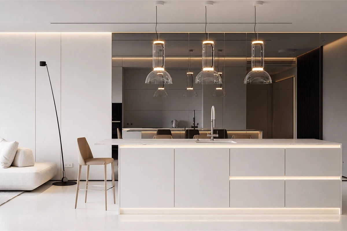 Layered modern kitchen lighting with island pendants and task lights