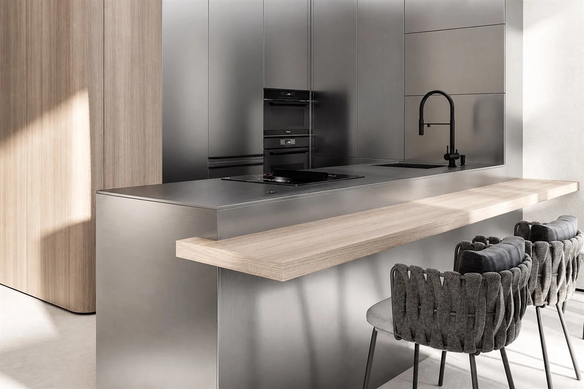 Brushed stainless steel island with wood breakfast bar Brushed stainless steel kitchen island with natural wood breakfast bar