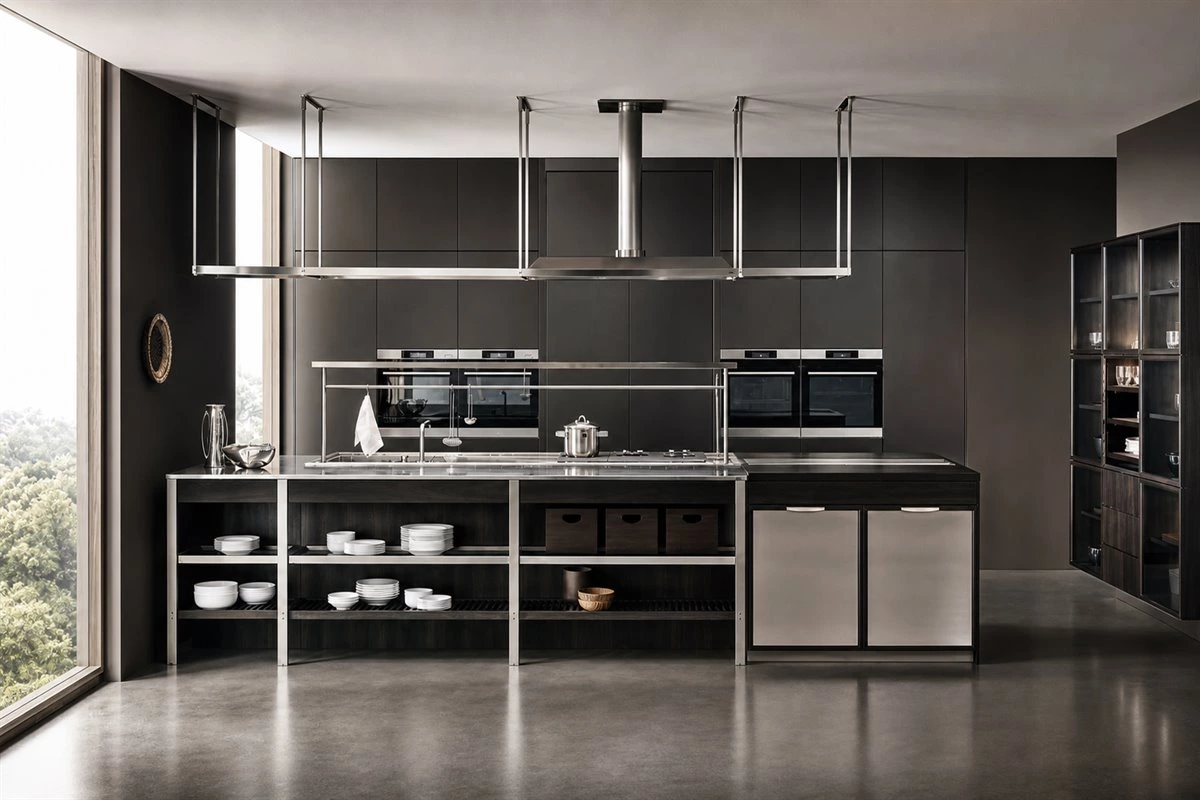 Stainless Steel Kitchen With Expandable Island Modern stainless steel kitchen with expandable dining island and glass cabinets