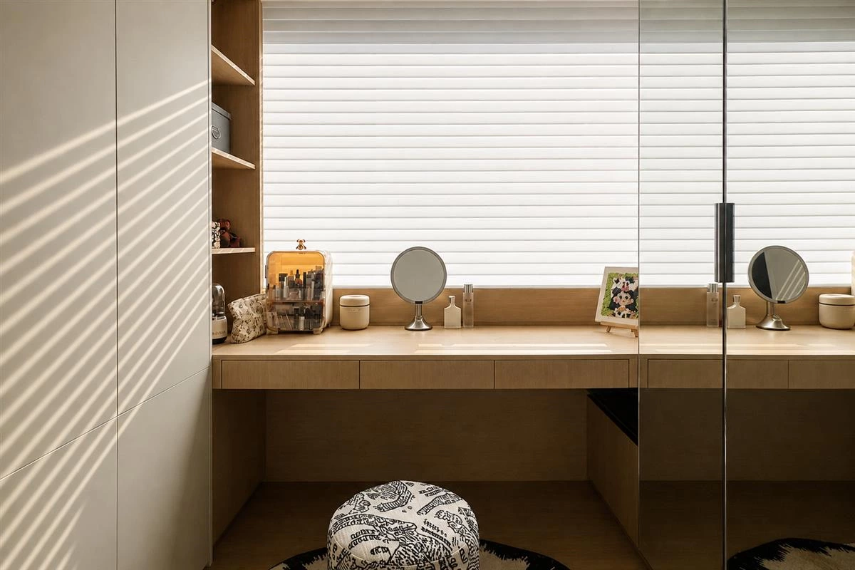 Walk in closet mirror creating a brighter spacious dressing area